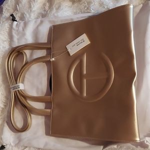 Medium, gold Telfar shopping bag